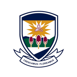 School crest with navy shield, gold sunburst, three flowers, and banner reading “Crescamus Floreamus”