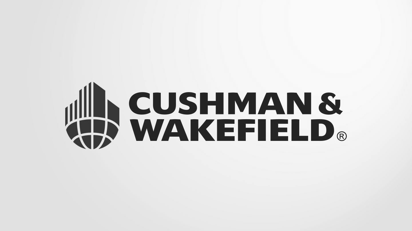 Cushman & Wakefield logo: Black stylized buildings and globe with company name.