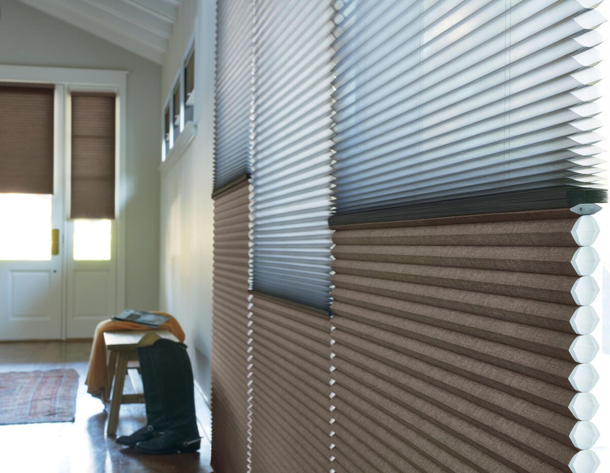 Hunter Douglas Duette® Shades Honeycomb shades filtering light into an entryway in Hopkins, MN.