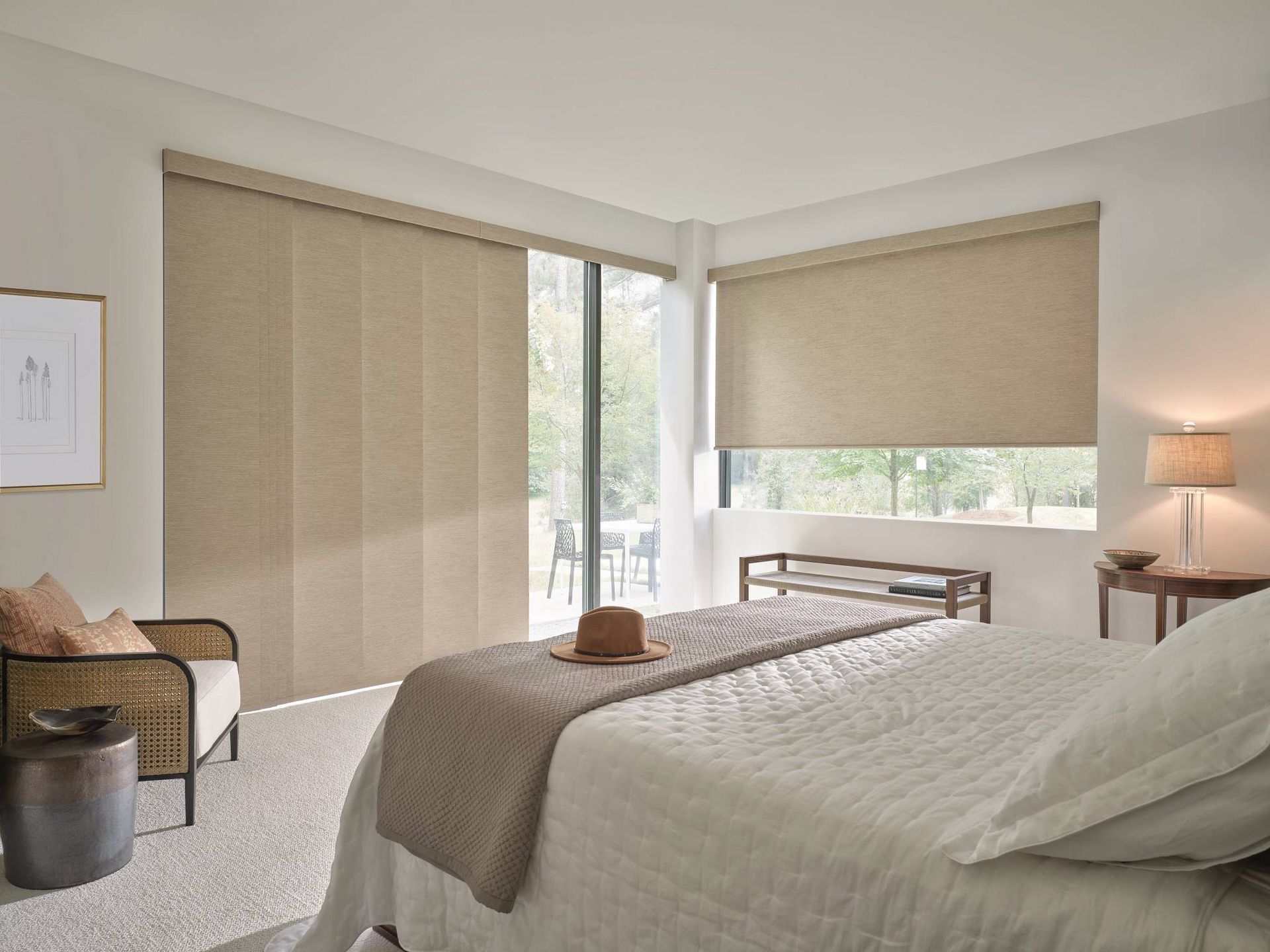 Hunter Douglas Designer Solar Shades covering multiple bedroom windows.