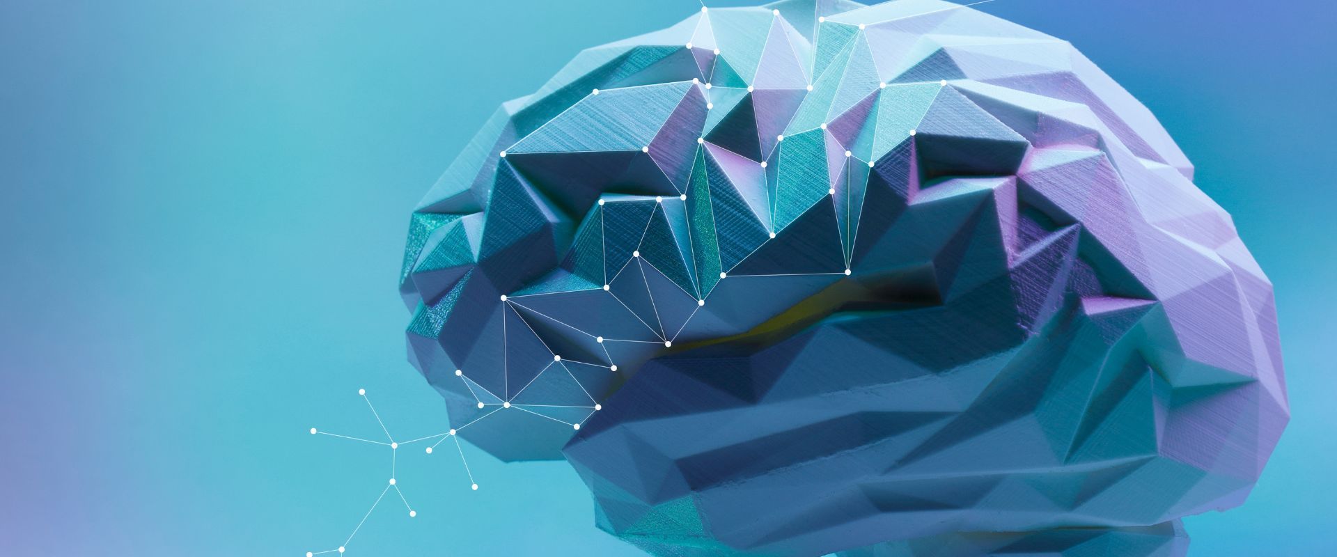 A low poly brain made of triangles on a blue background.