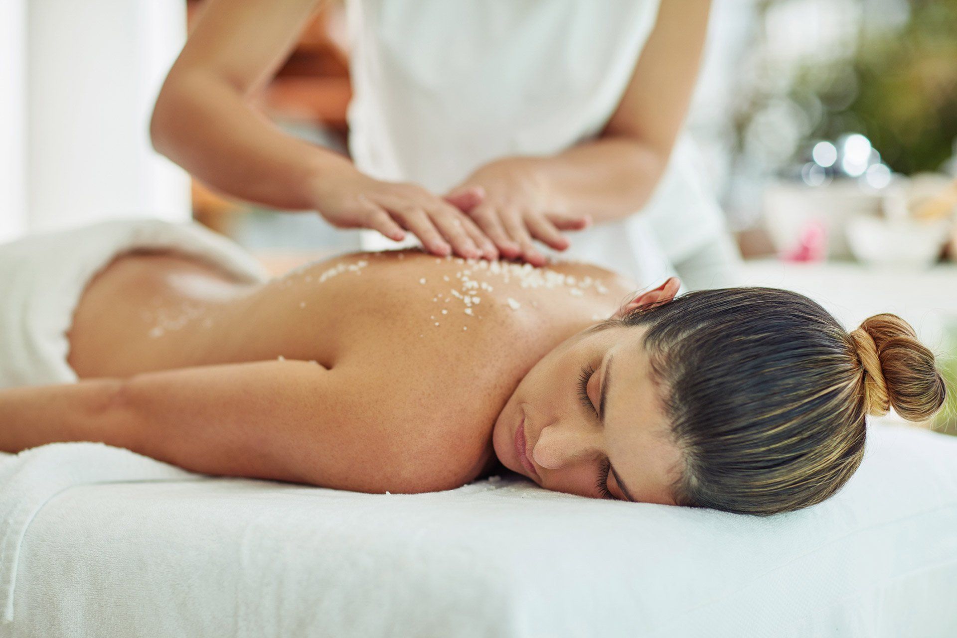 Woman getting an exfoliating treatment at the spa — Springfield, Il — Reset Spa