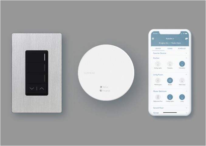 A phone a light switch and a smoke detector on a gray background. Premier Lighting & Home Automation in Dallas Fort Worth (DFW).