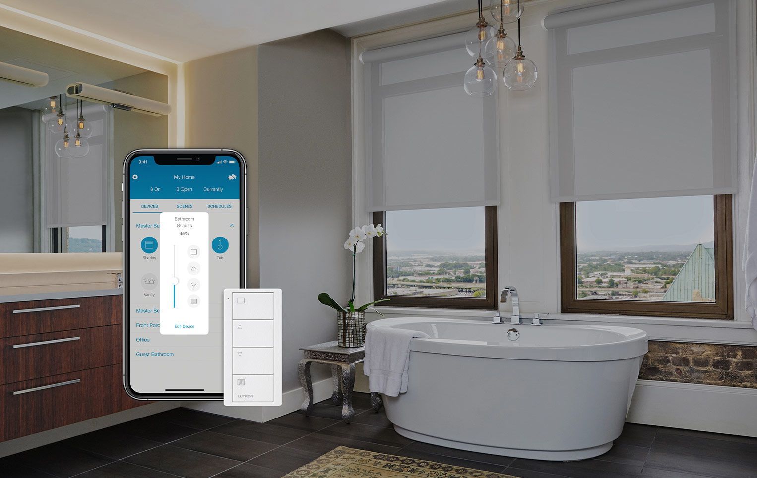 A bathroom with a bathtub , mirror , and a cell phone. Premier Lighting & Home Automation in Dallas Fort Worth (DFW).