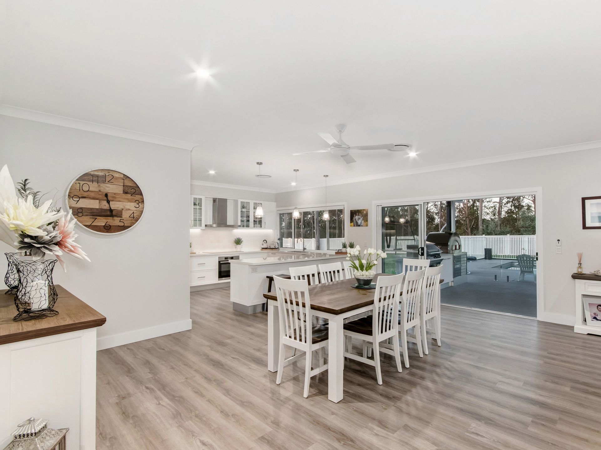 A Bright, Modern Open-plan Living Room With White Decor — Michael Duncan Constructions Pty Ltd in Robina, QLD