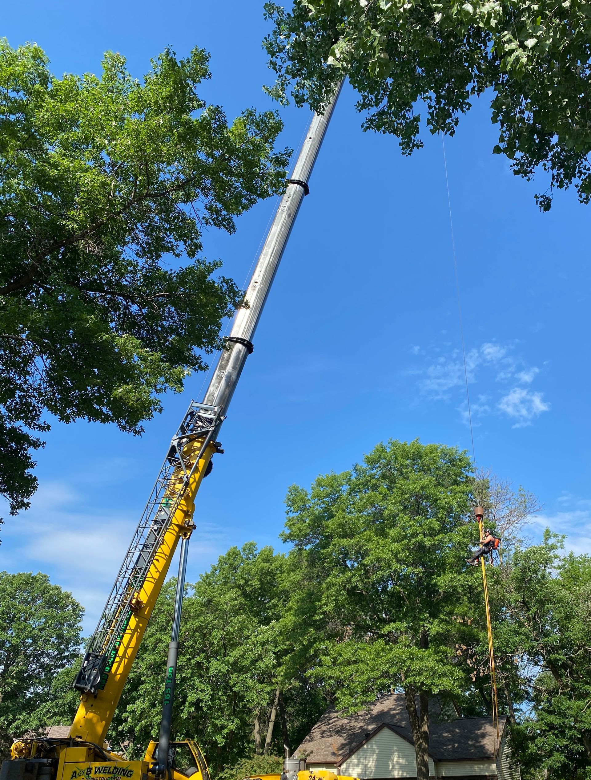 Tall Yellow Crane | Minneapolis, MN | Arbor Tree Service