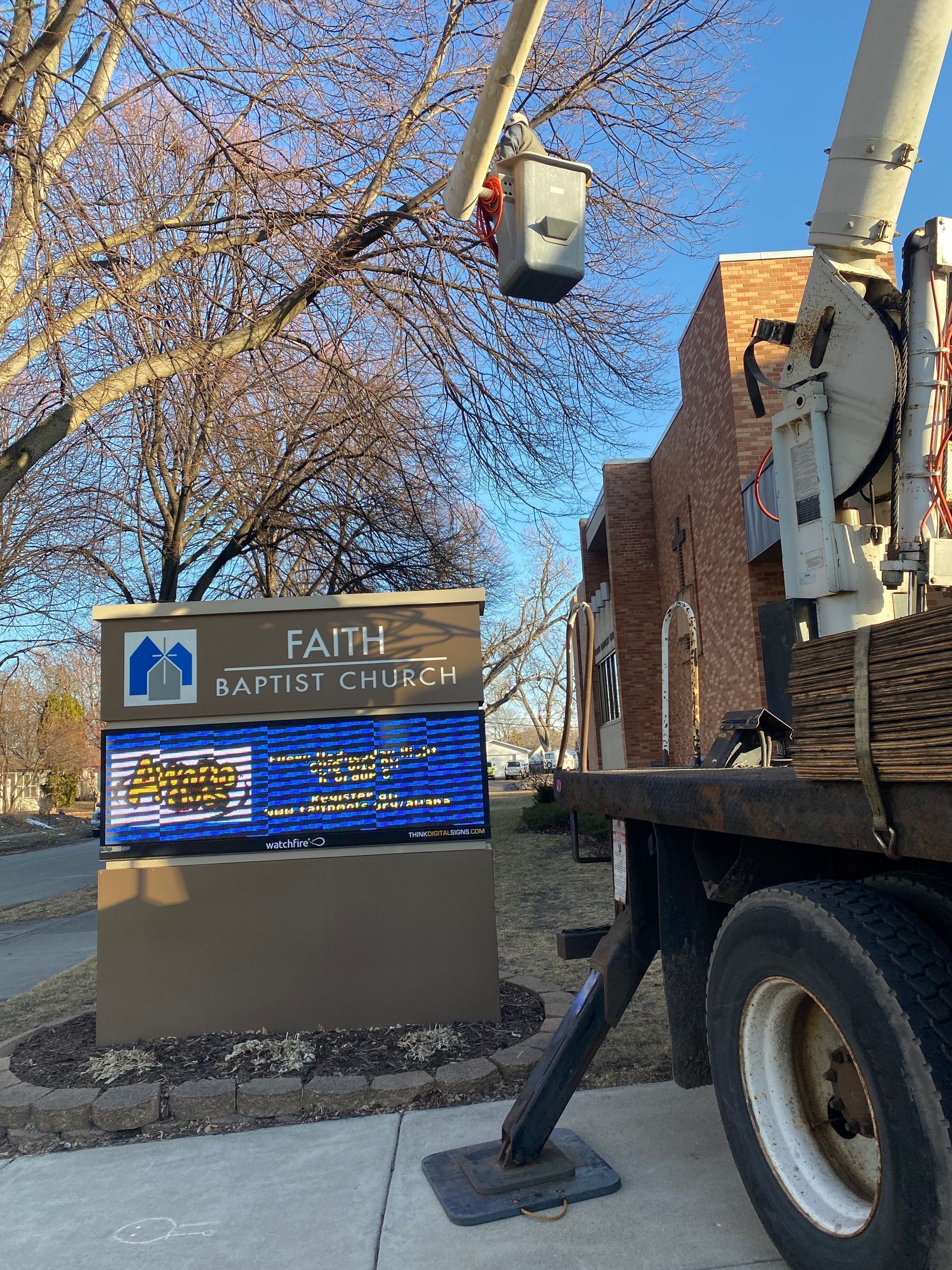 A Crane in Front of a Church | Minneapolis, MN | Arbor Tree Service