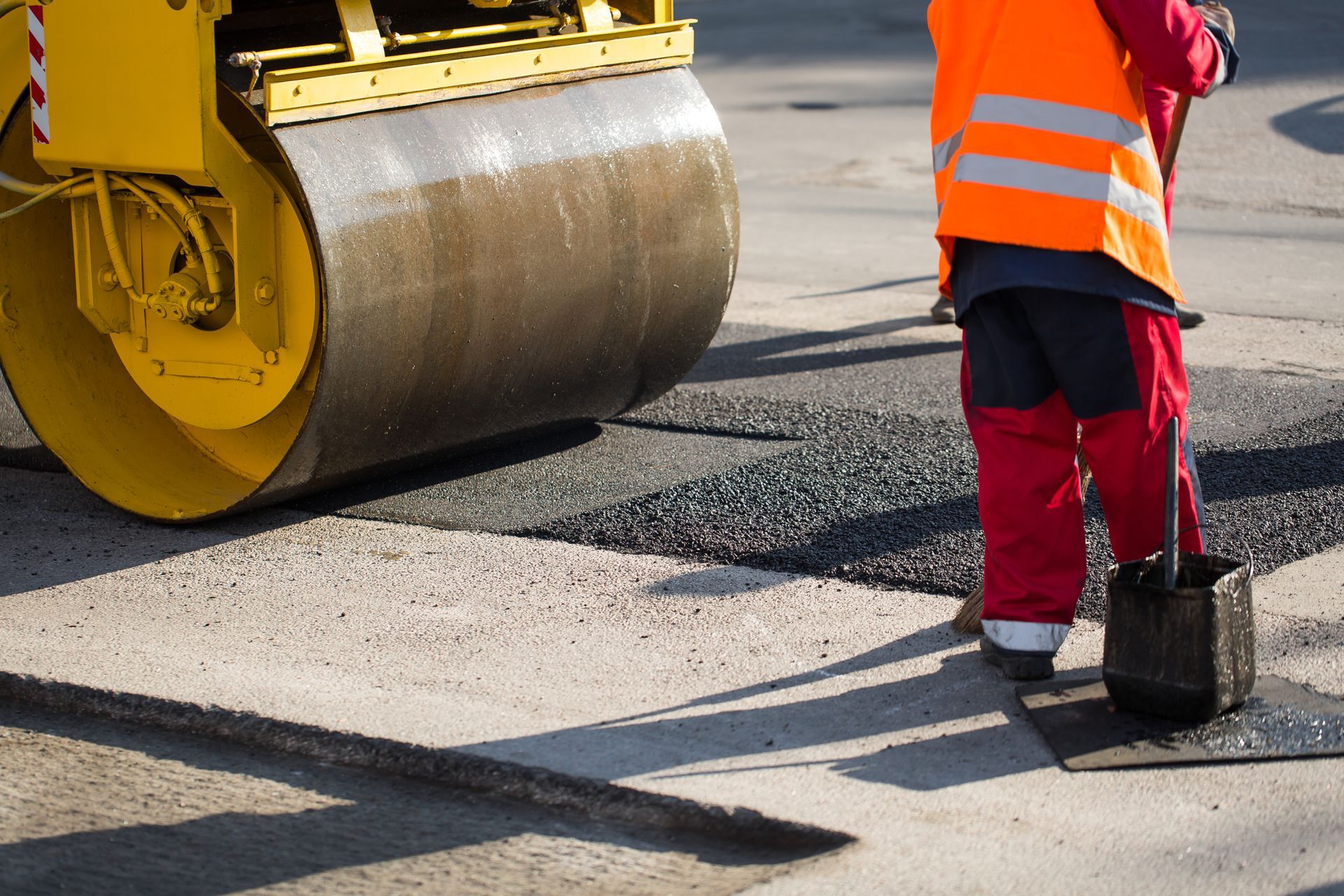 road roller compacting asphalt