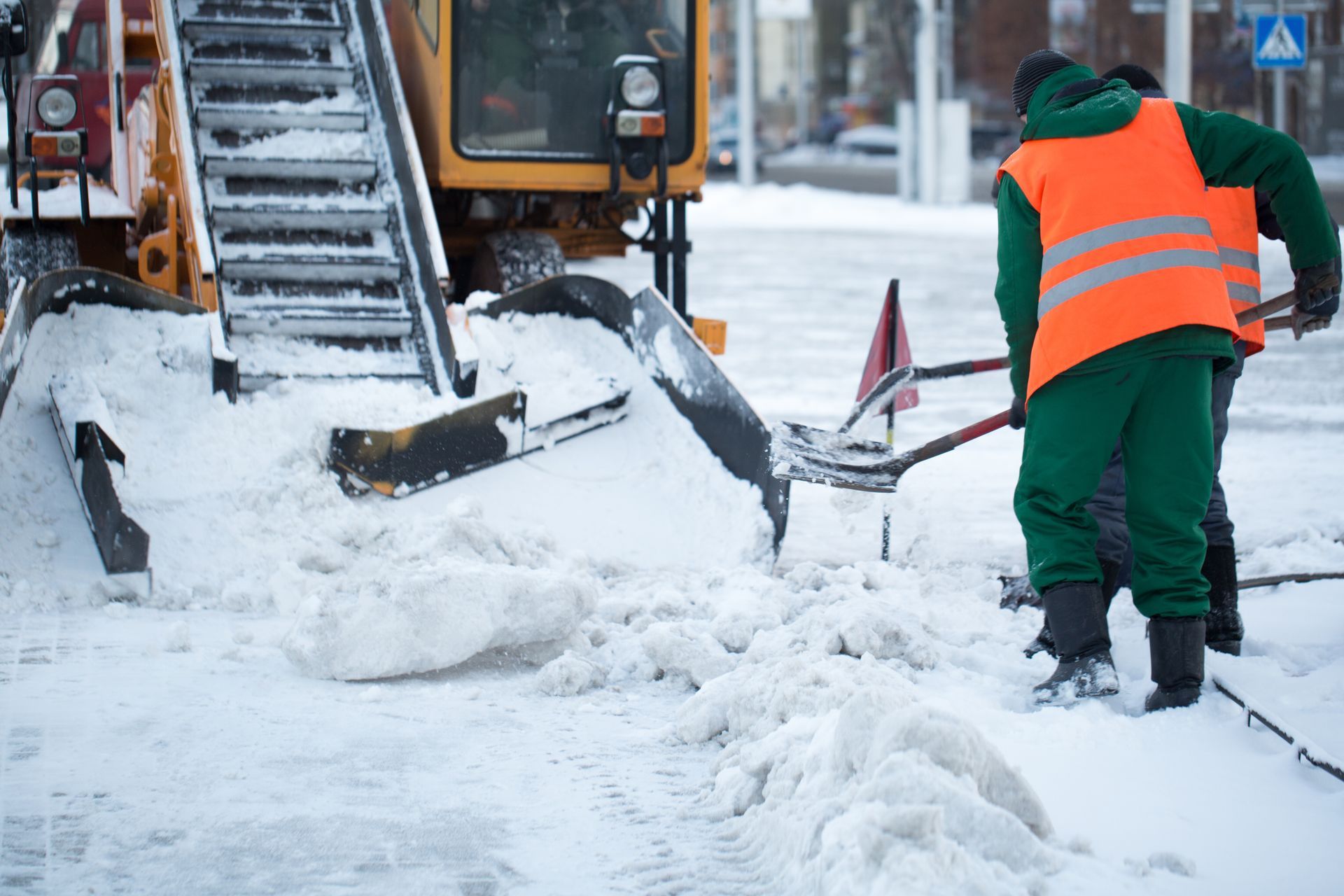 tractor cleaning road from snow excavator cleans streets large amounts snow