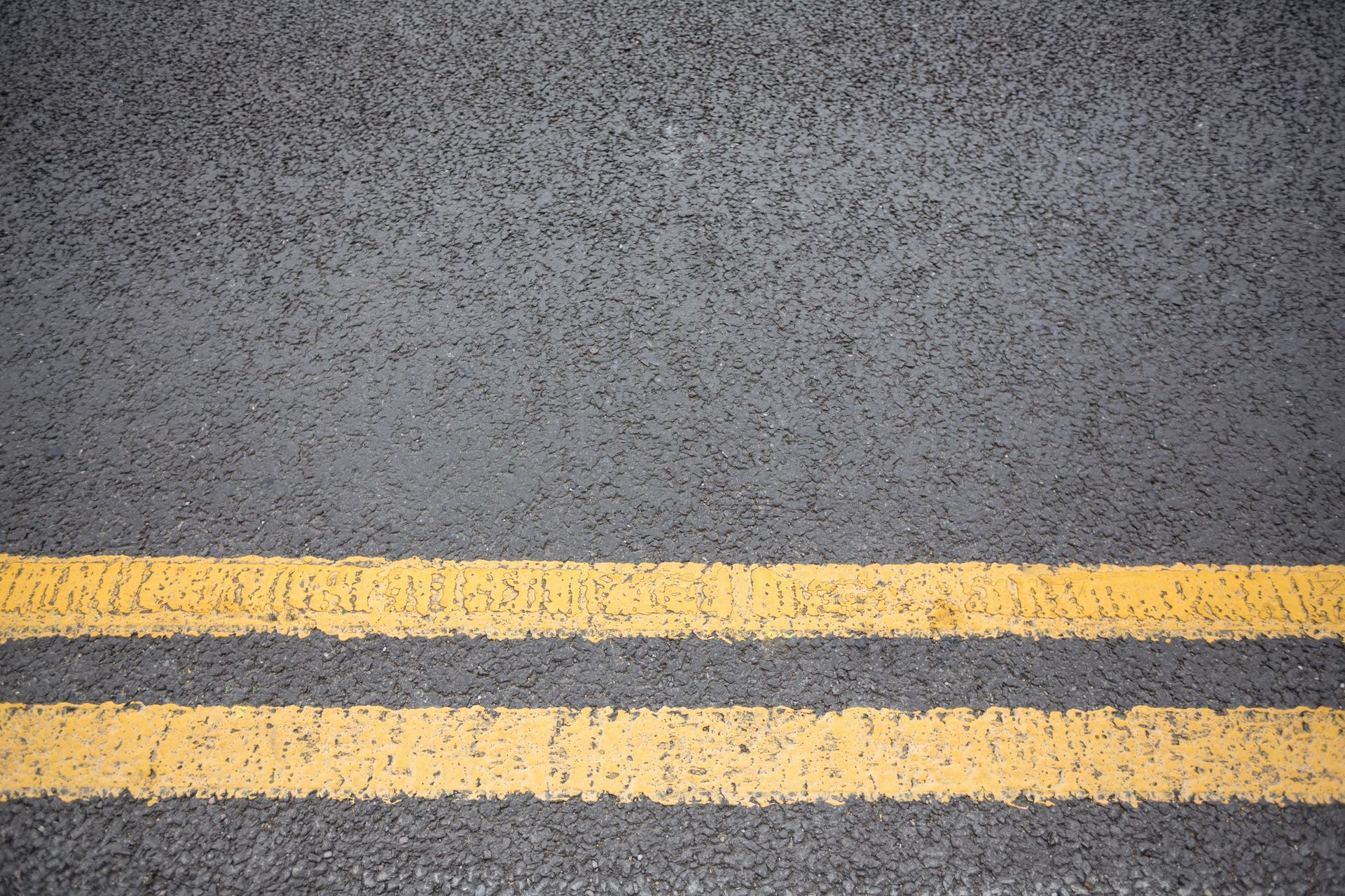 road with yellow surface marking
