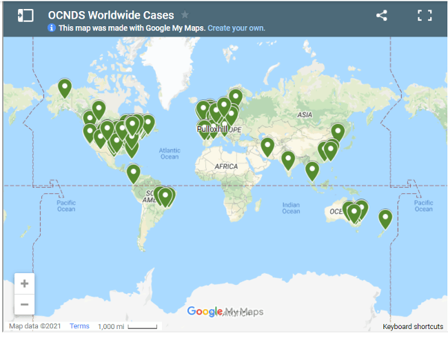 A map of the world with green pins on it.