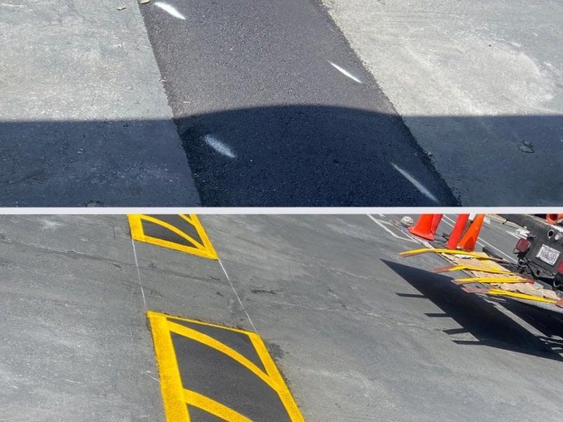 A shadow of a car is cast on a concrete surface