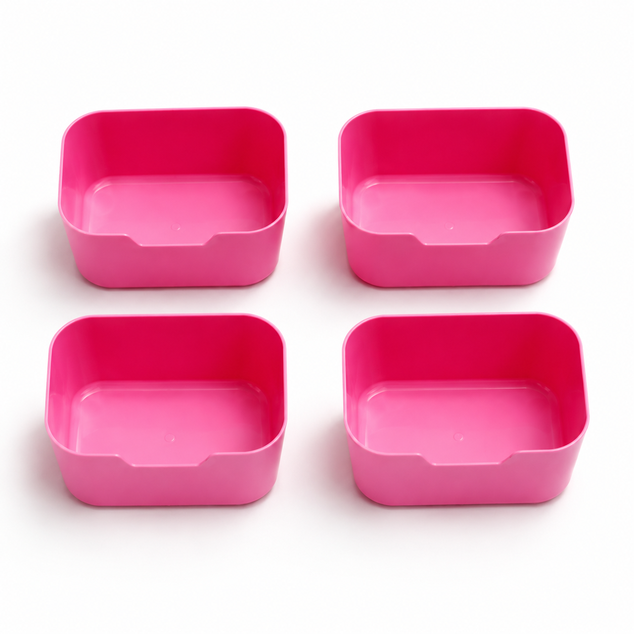 Four bright pink square bowls arranged in a 2x2 grid on a white background