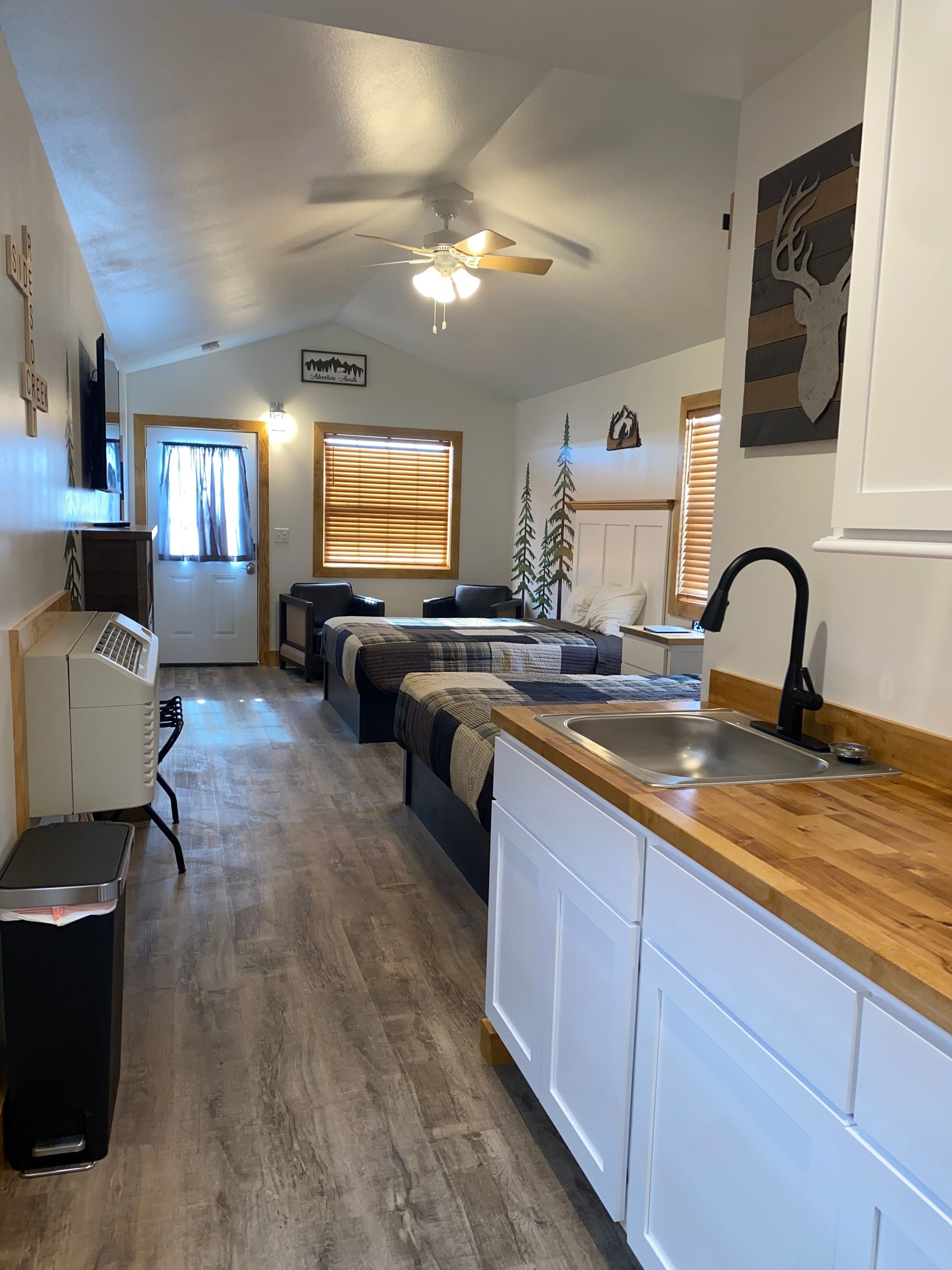 Kitchen and Two Queen Beds in Cabin 4 at Creek Side Resort
