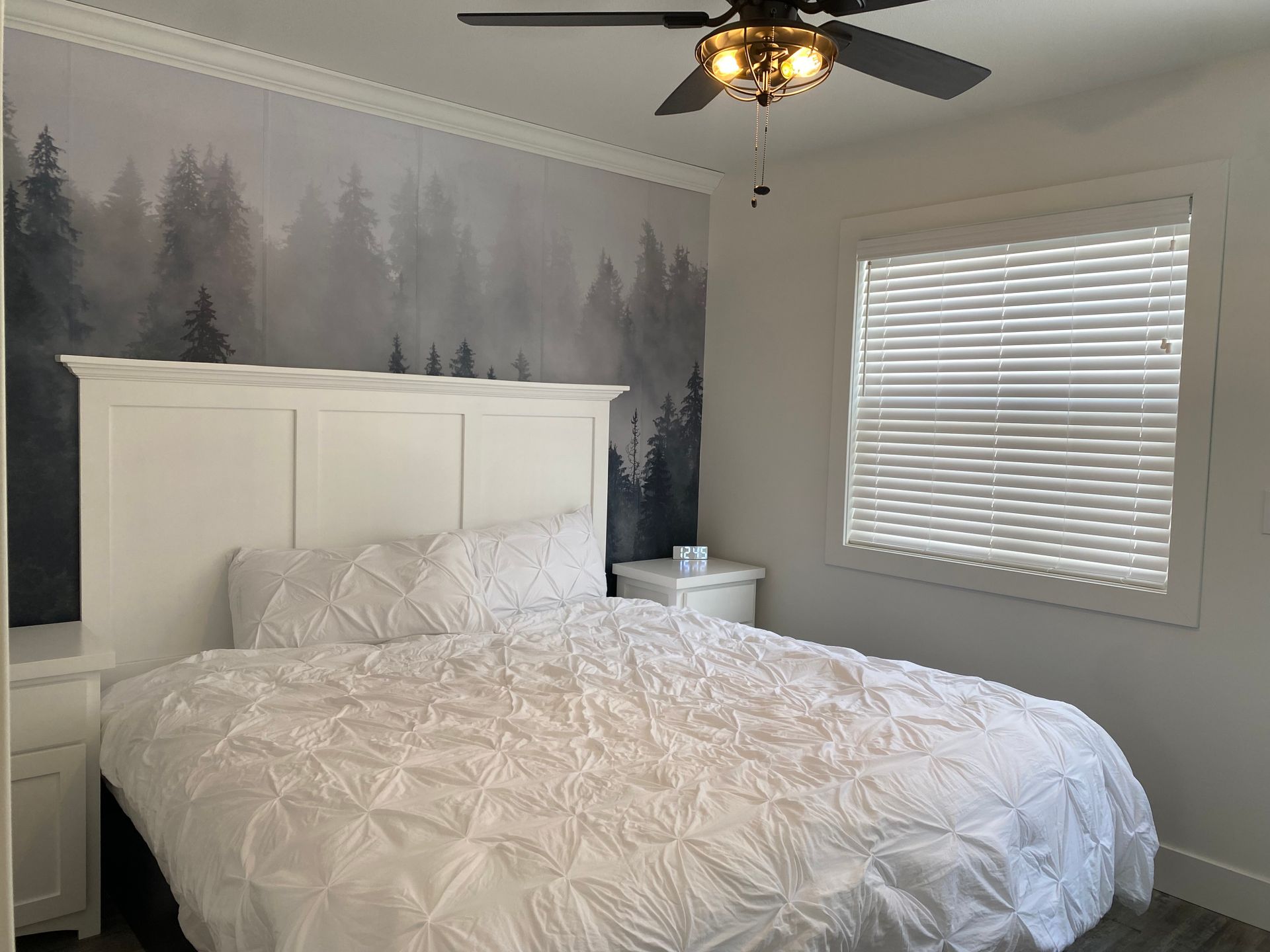 King bed in Cabin 6 at Creek Side Resort.