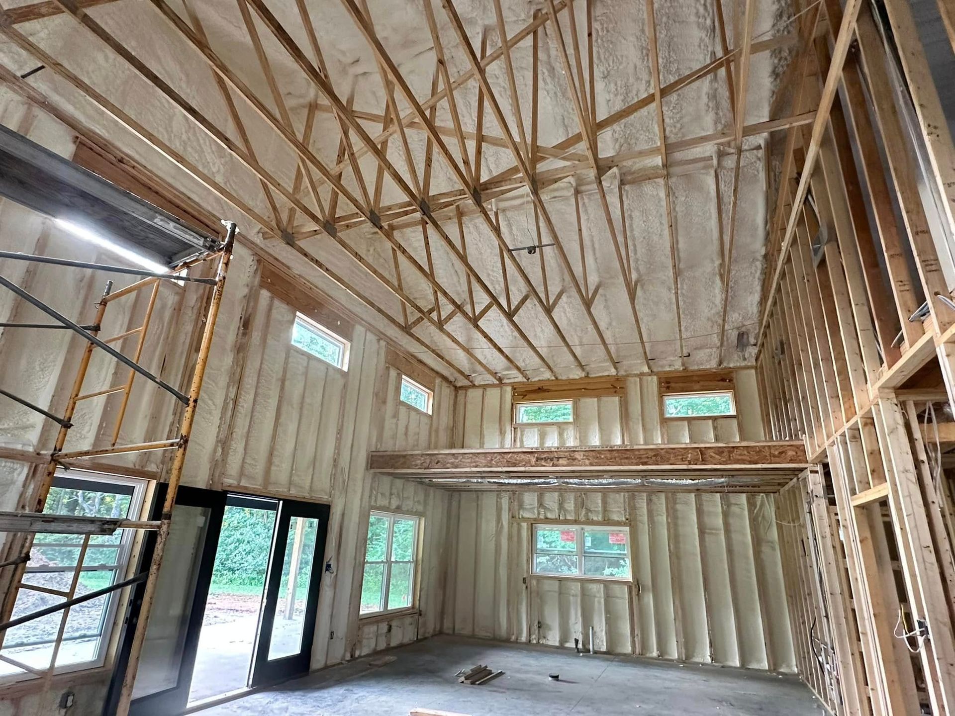 A large room with a ceiling that is covered in insulation.