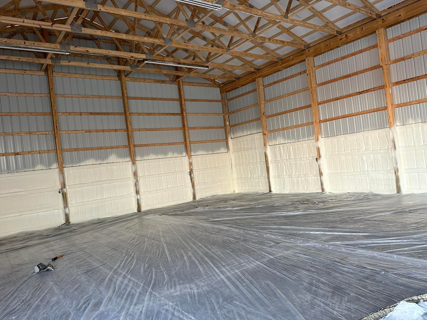A large empty building with a lot of foam on the walls.