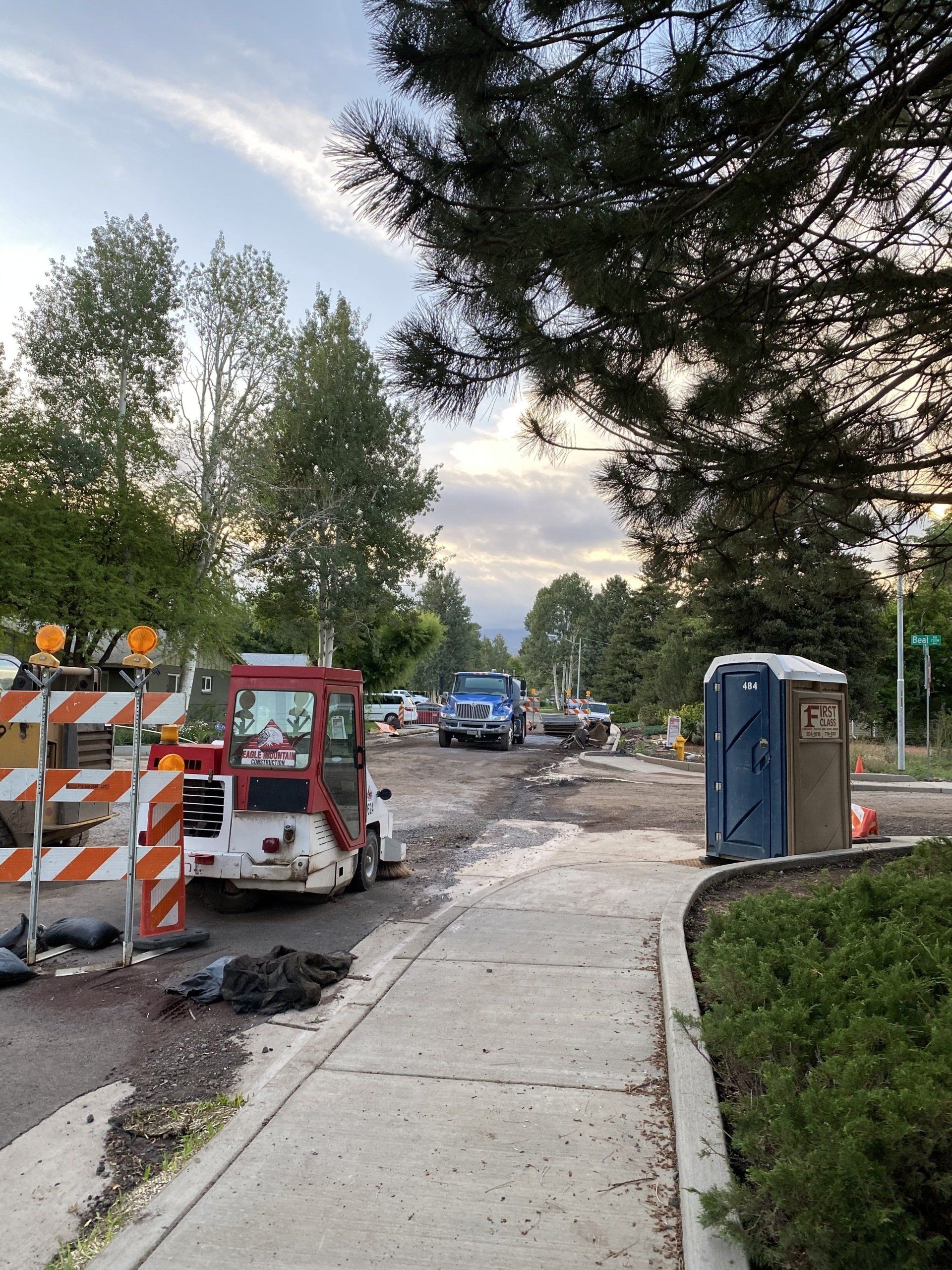 Portable restroom near a truck | Flagstaff, AZ | First Class Sanitation