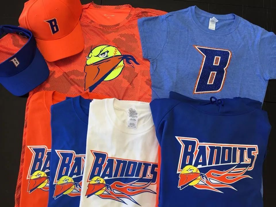 Blue and orange Bandits apparel, including shirts, hats, and shorts, laid out together