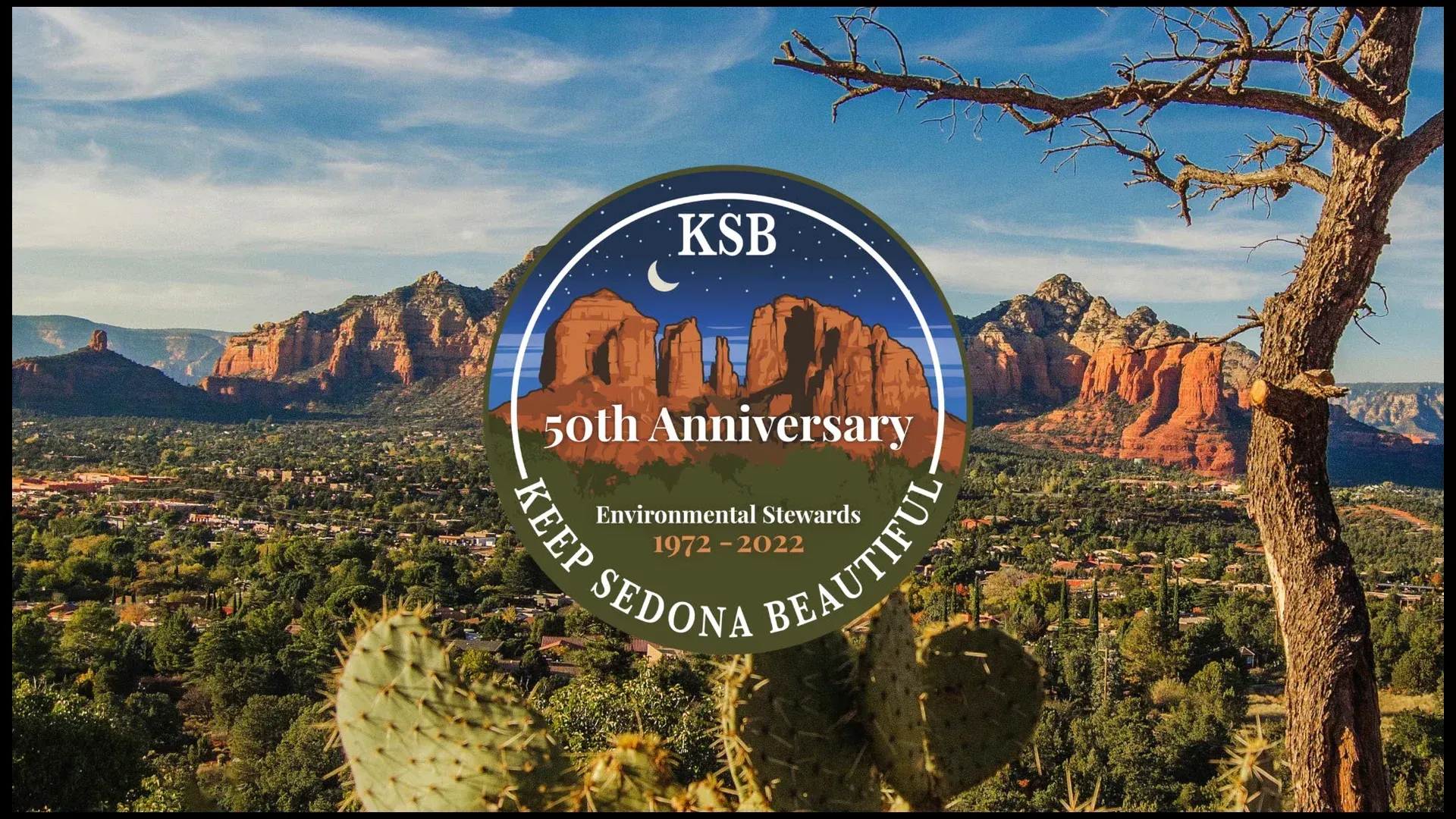 A ksb 50th anniversary logo with mountains in the background