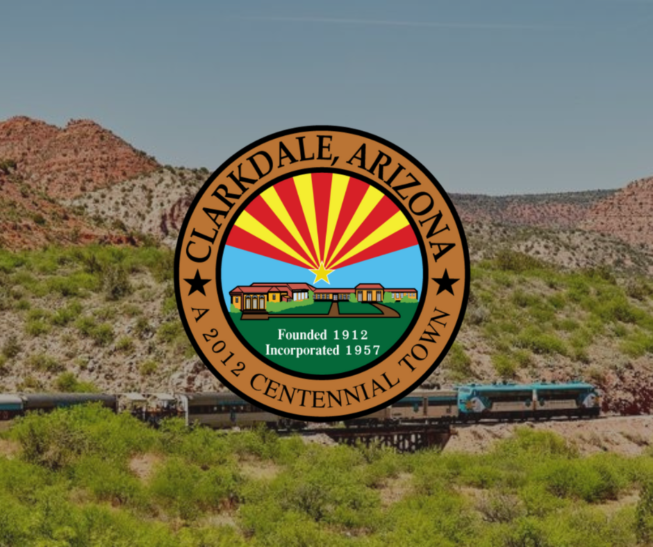 A logo for clarkdale arizona with a train in the background