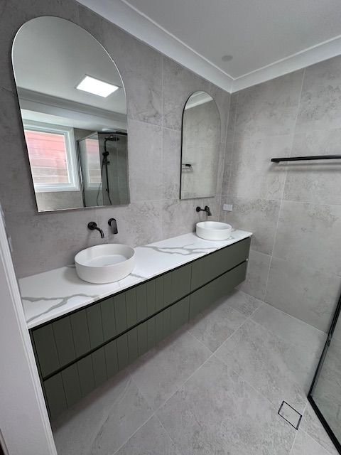 Modern Bathroom With Green Vanity — Custom Design Bathroom Renovations in Port Macquarie, NSW