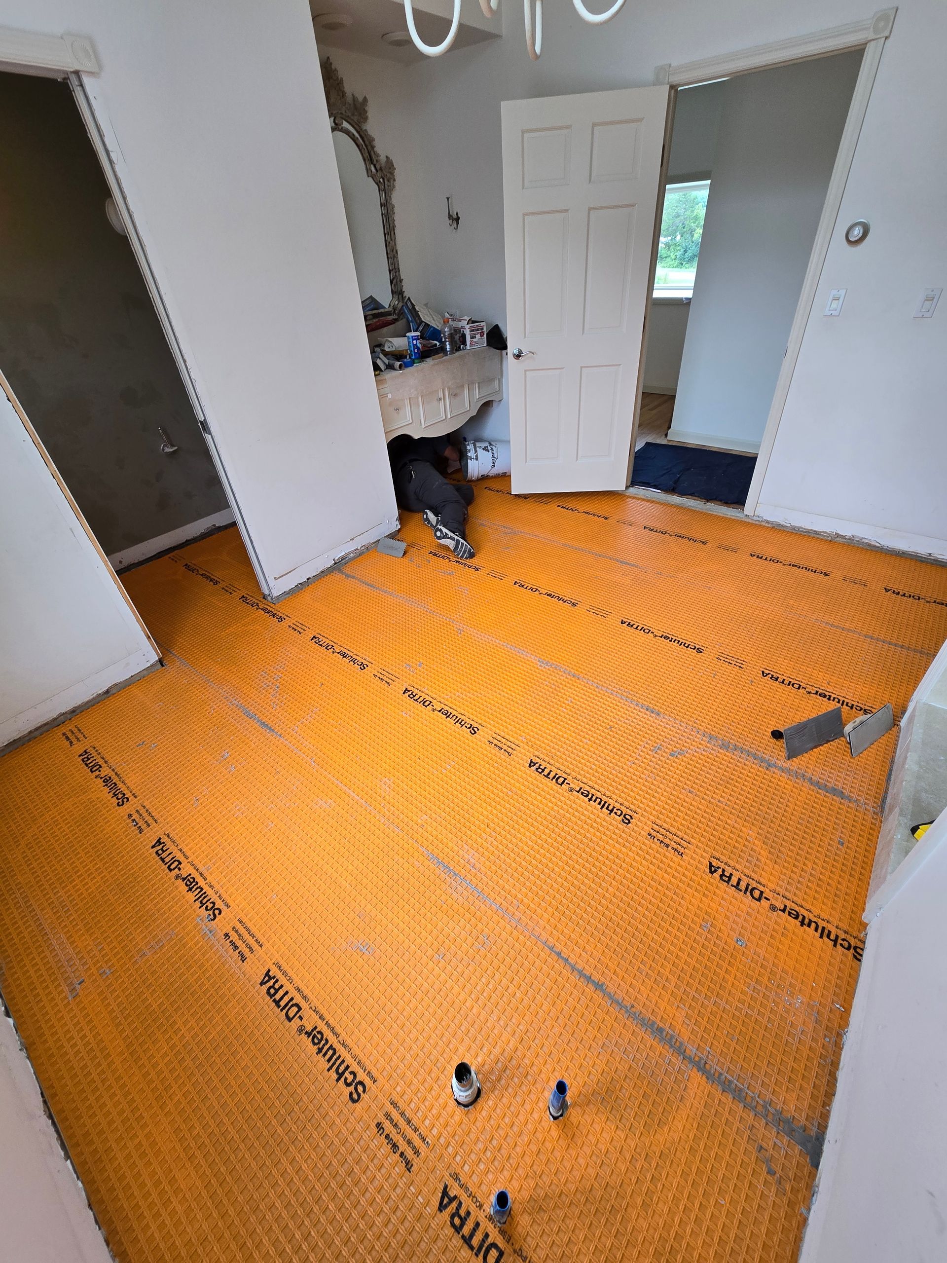 A room with a lot of orange foam on the floor.