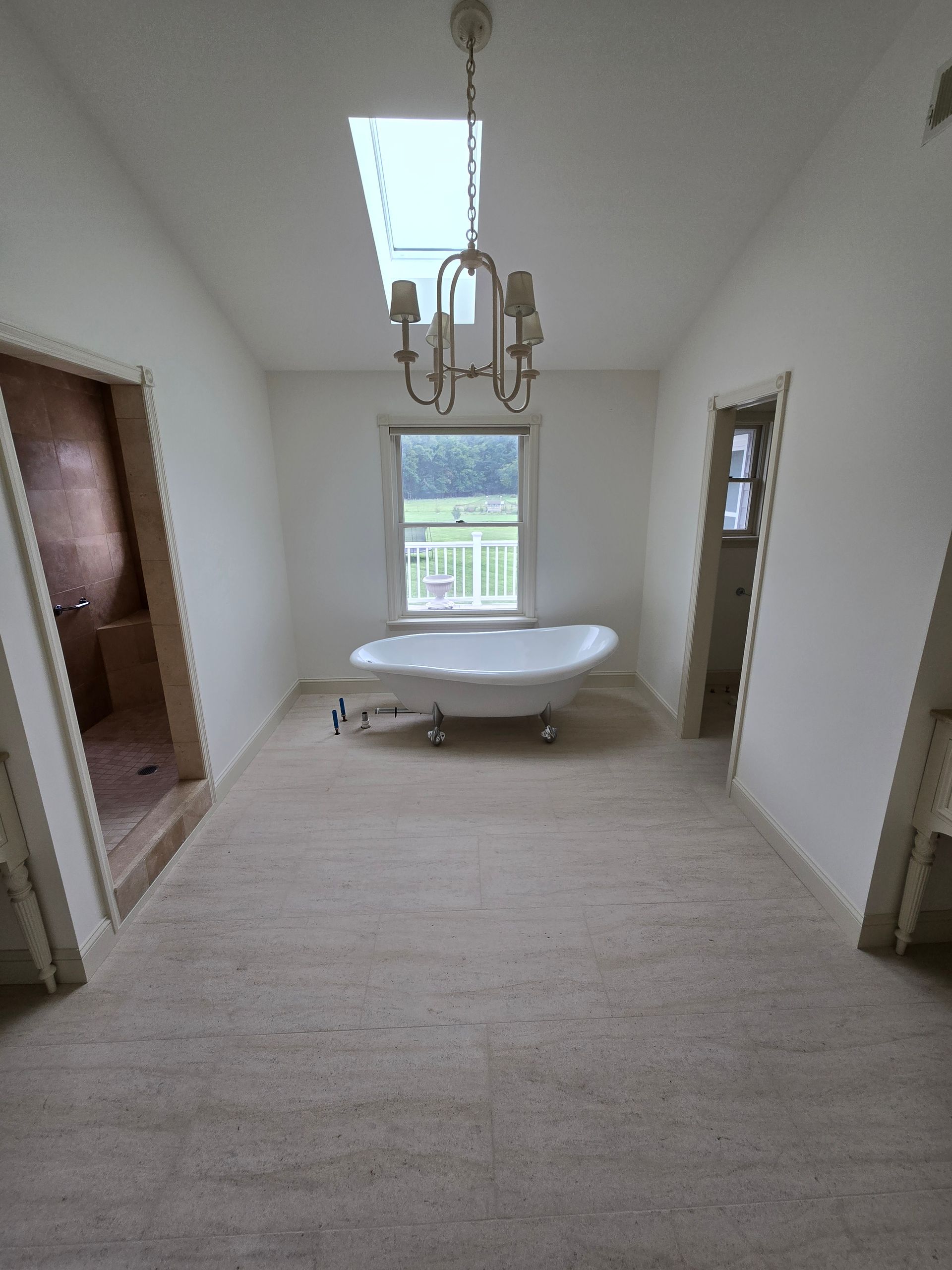There is a bathtub in the middle of the room.