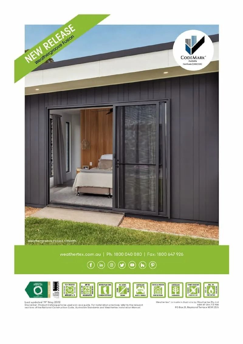 A Modern Building with Dark Gray Sliding Doors and A Mesh Screen — Express Timber Solutions In Long Jetty, NSW