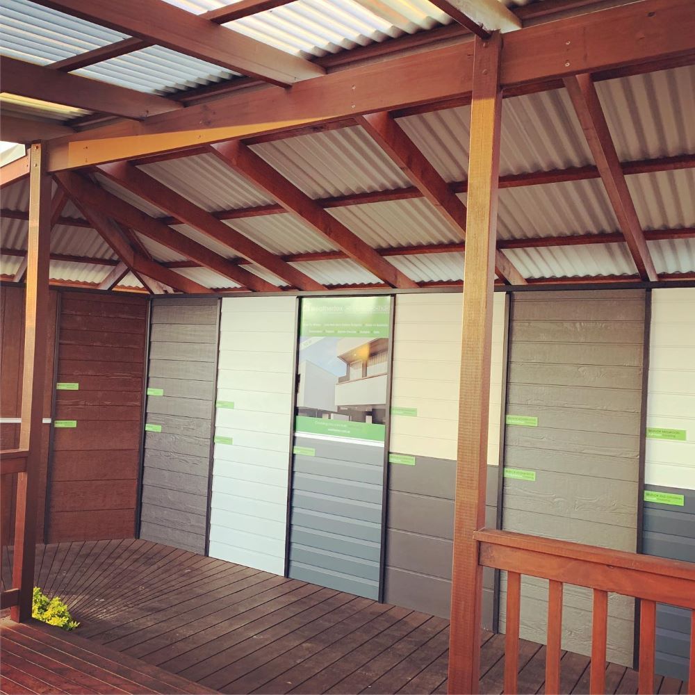 Wooden Display Showcasing Various Colored Siding Panels — Express Timber Solutions In Long Jetty, NSW