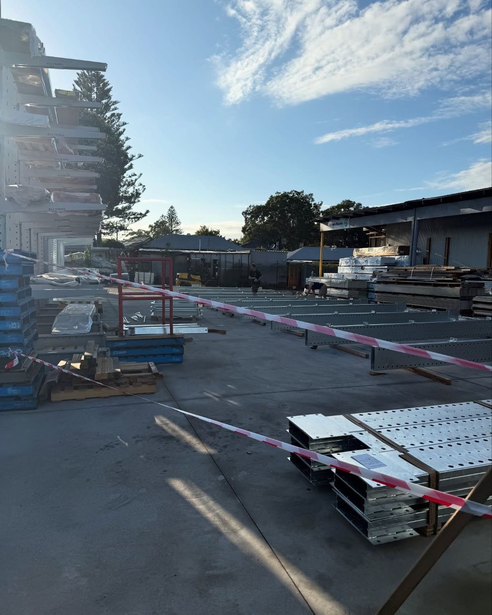 Outdoor Construction Site with Materials, Warning Tape — Express Timber Solutions In Long Jetty, NSW