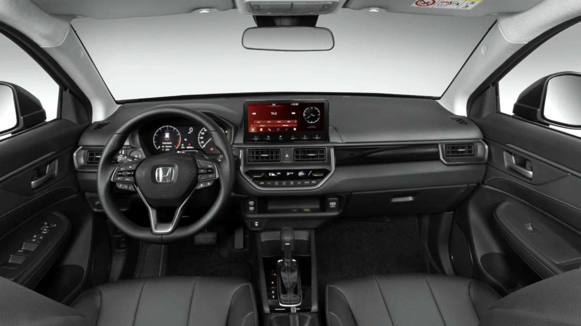 Car interior view with dashboard, steering wheel, center console, and front seats