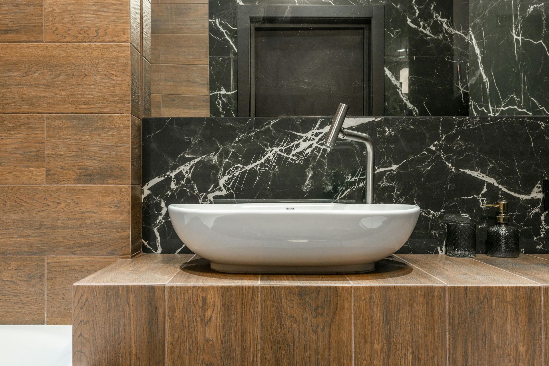 A fully installed new bathtub after a renovation