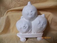 3 pumpkins in wagon
