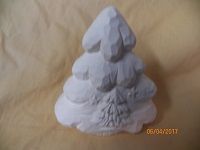 small carved tree with star and tree