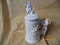 small stein with football players