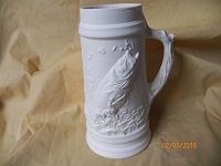small tankard with fish
