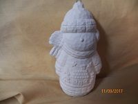 snowman ornament with house scene