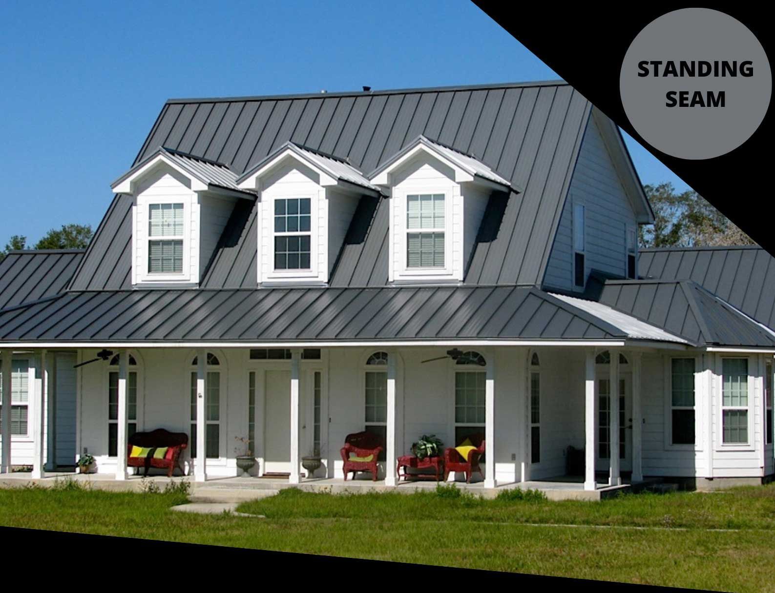 A white house with a standing seam metal roof