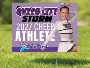 Purple sports sign reading “Queen City Storm Dance 2027 Athlete” with a child dancer in red on the right