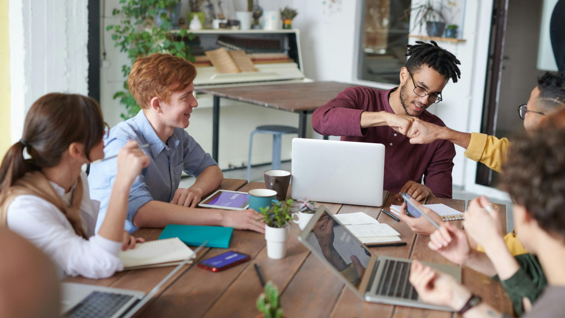 small business team building operational systems together