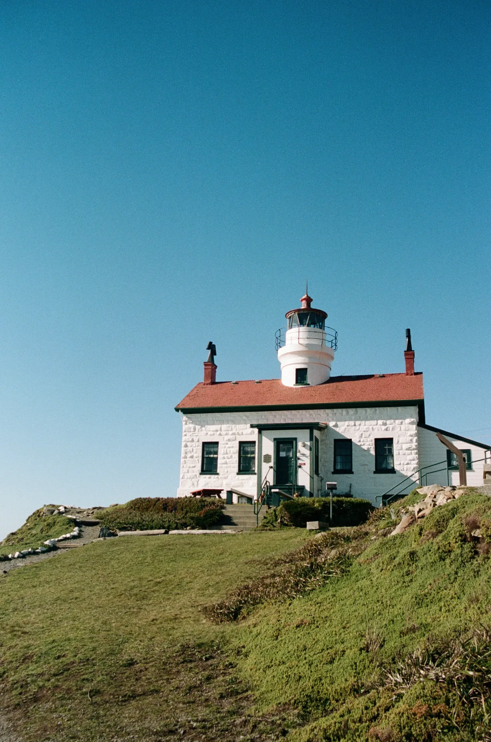 A film photograph of the Battery Point lighthouse in California
