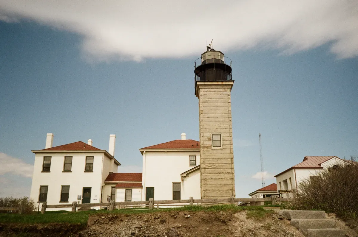 A film photograph of the Beavertail lighthouse in Rhode Island