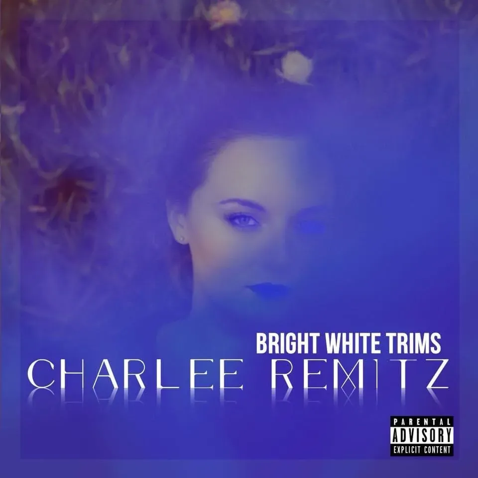 Album cover: Woman in blue, blurred effect, "Bright White Trims" by Charlee Remitz with parental advisory.
