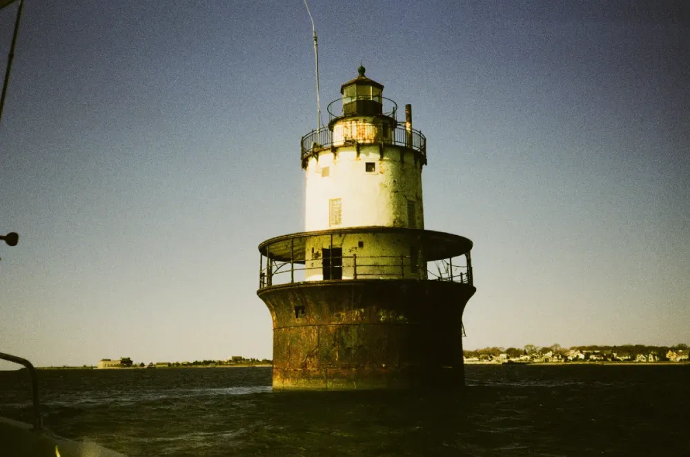 A film photograph of the Butler Flats lighthouse in Massachusetts