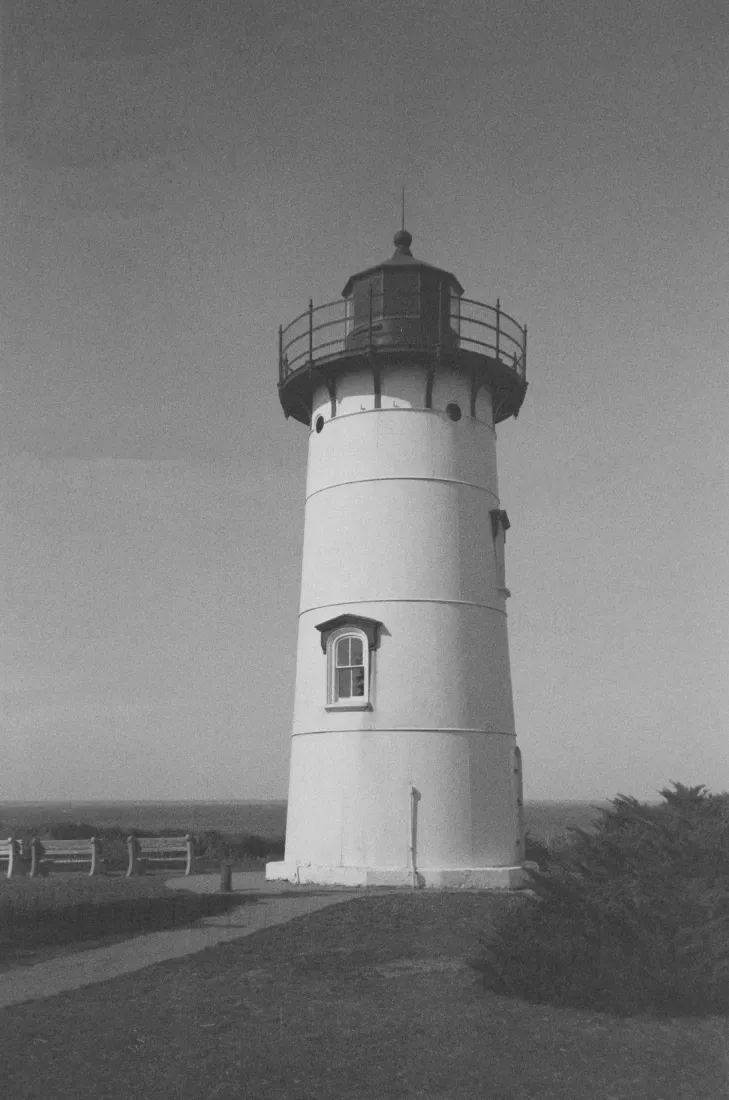 A black and white portrait film photograph of East Chop lighthouse in Massachusetsts