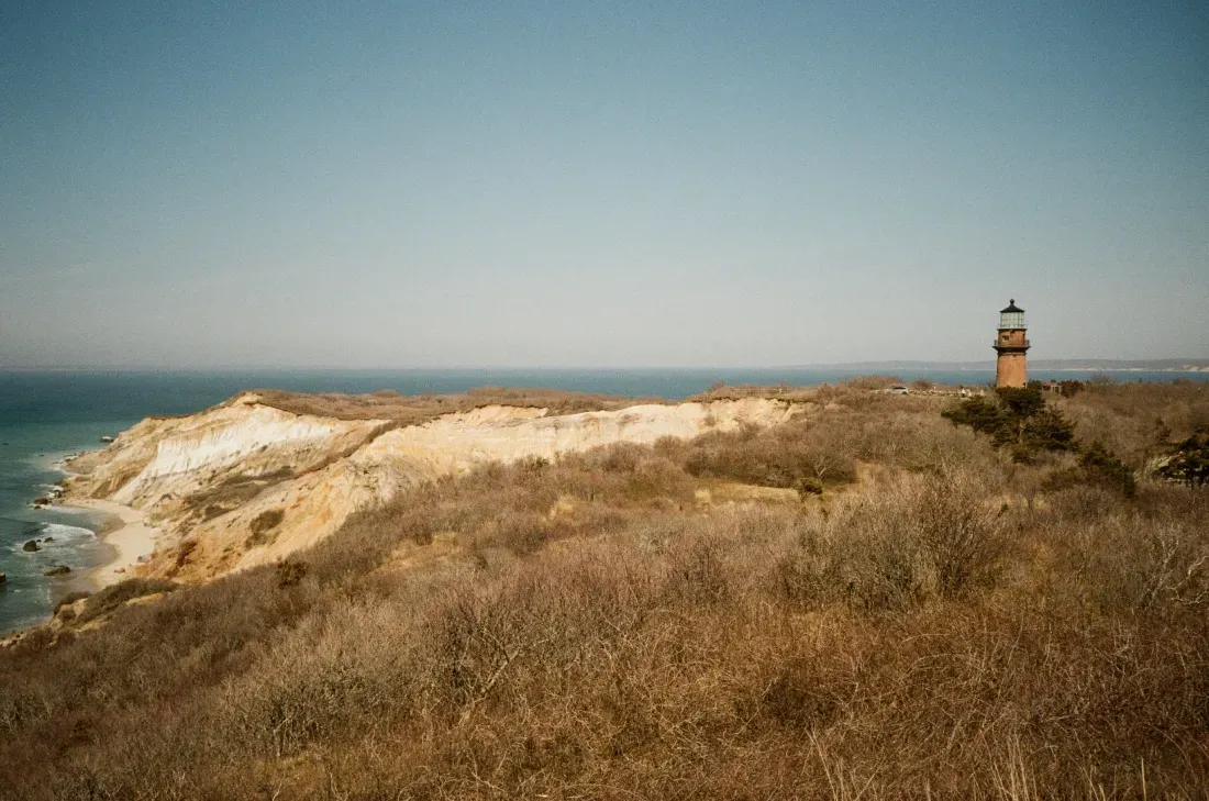 A landscape film photograph of Gay Head lighthouse in Massachusetts from a distance