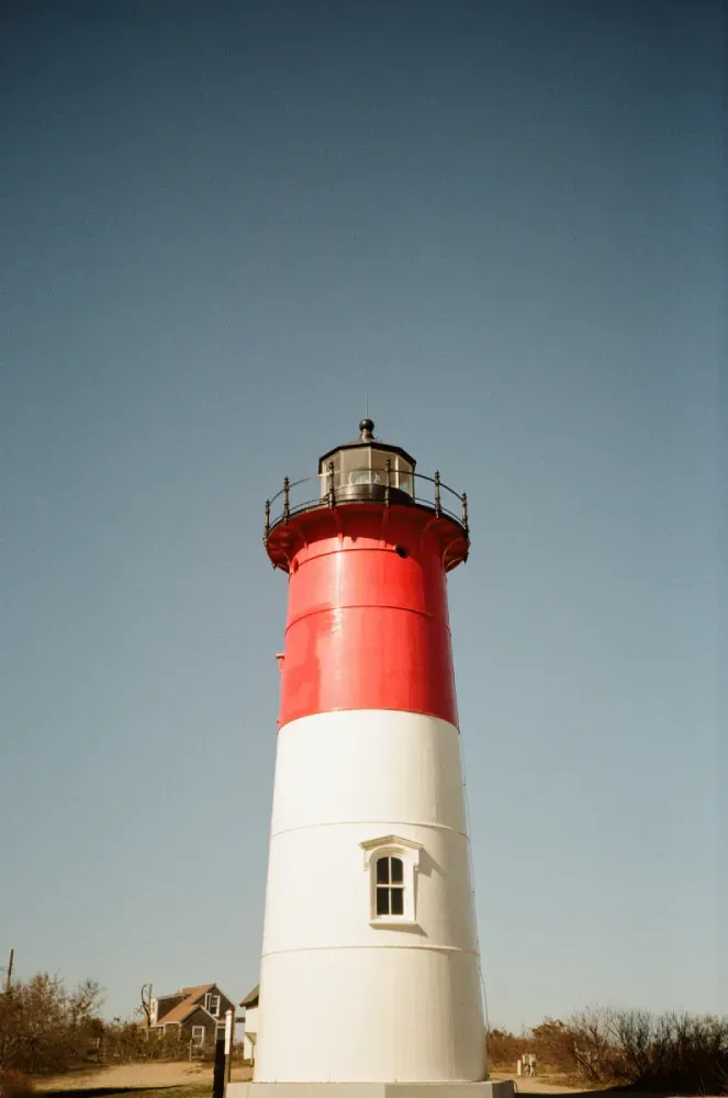 A film photograph of the Nauset lighthouse in Massachusetst