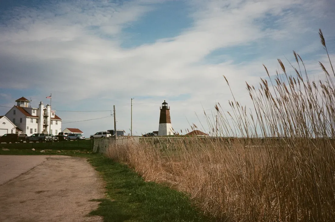 A landscape film photograph of Point Judith lighthouse in Rhode Island