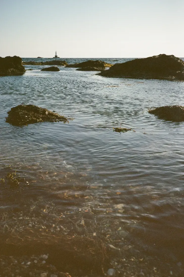 A film photograph of the Sakonnet lighthouse in Rhode Island